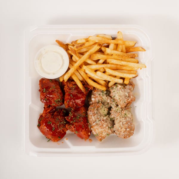 King's Chicken Wings combo with red sauced wings, garlic parmesan wings, fries, and ranch.